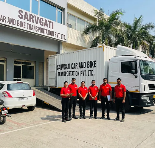 Sarvgati Car & Bike Transportation Pvt. Ltd. Chandigarh team outside office with closed container truck, car and bike (CH number plate)