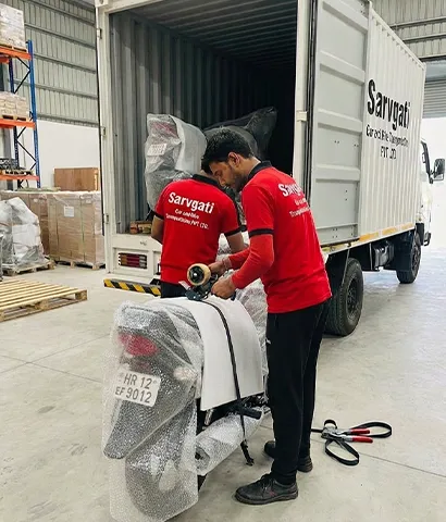 Bike being carefully packed for transport