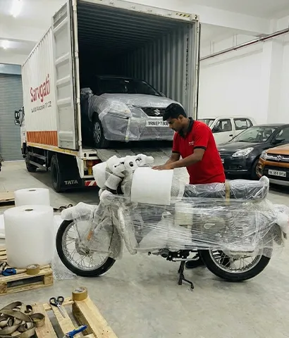 Motorcycle being packed for transit protection