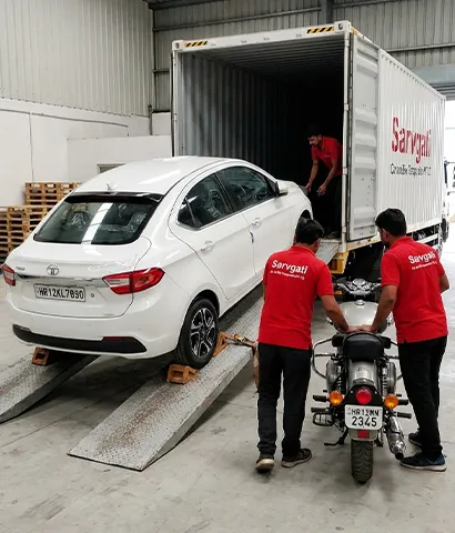 Car and bike loaded together on a carrier