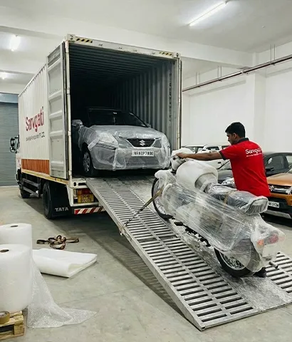 Car and bike loaded together on a carrier