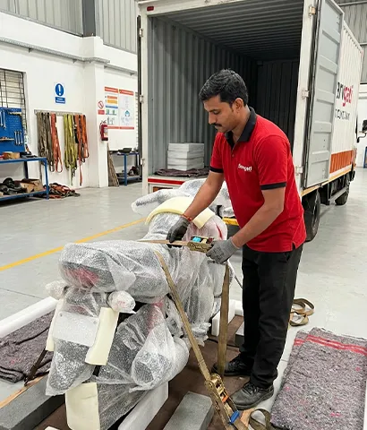 Vehicle secured before transportation in a container