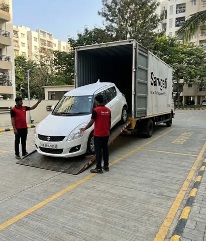 Vehicle being delivered and unloaded at the destination