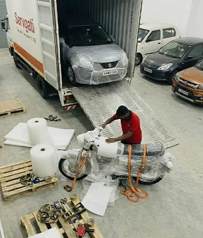 Vehicle secured and packed inside a container