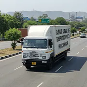 Sarvgati team delivering CH number plate car safely to customer in Chandigarh