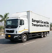 Closed container truck transporting CH number plate vehicle from Chandigarh