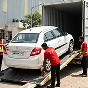 Vehicle transport truck carrying HR number plate car from Gurugram highway