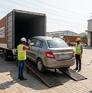 HR registered car being loaded into closed container truck in Gurugram