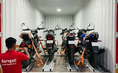 Motorcycles secured inside enclosed transport carrier