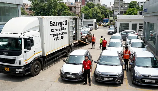 Corporate and dealer bulk vehicle transport from Delhi using closed container carriers by Sarvgati Car and Bike Transportation PVT. LTD.