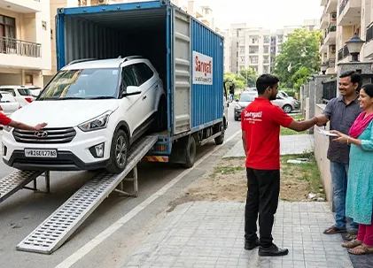 Car being unloaded from a container by Sarvgati team