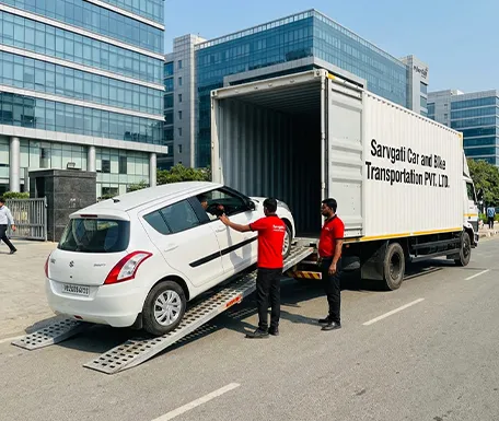 HR registered car being loaded into closed container truck in Gurugram Haryana for safe transportation