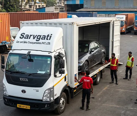 Car loading into closed container truck in Mumbai with MH number plate